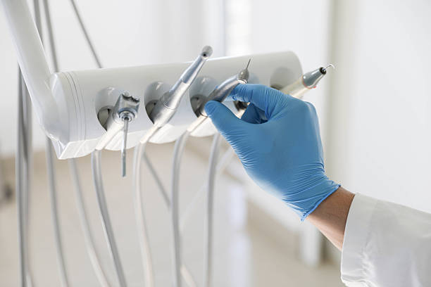 Professional Tooth Extraction technician working in Akron, OH
